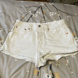 Levi’s white denim shorts. Very little stretch.
